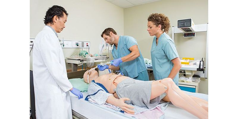 Students and instructor in a sim lab