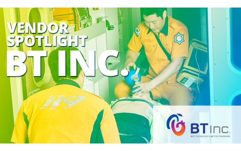 2 paramedics loading simulator into ambulance during scenario