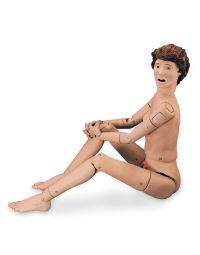 Keri Nursing Skills Manikin posed in an upright seated position with knees bent and hands resting on leg