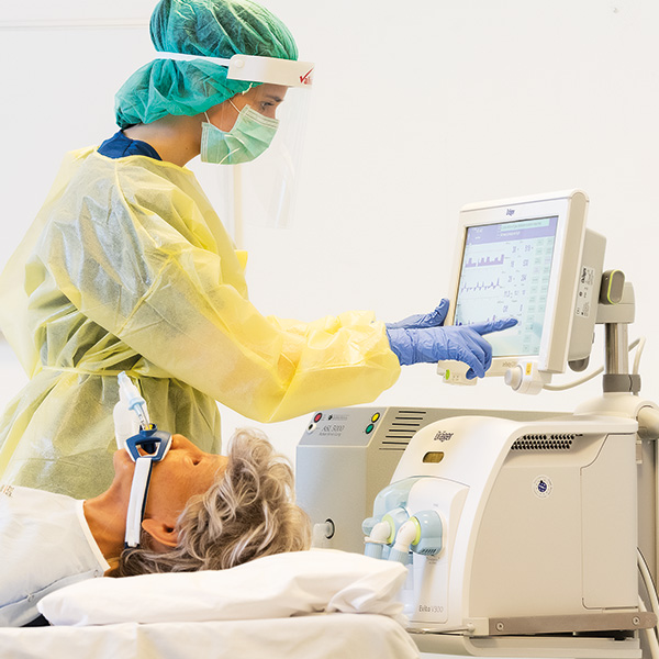 person practicing injections on a wearable skill trainer