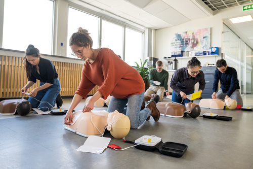 CPR class with Little Anne Stackable manikins